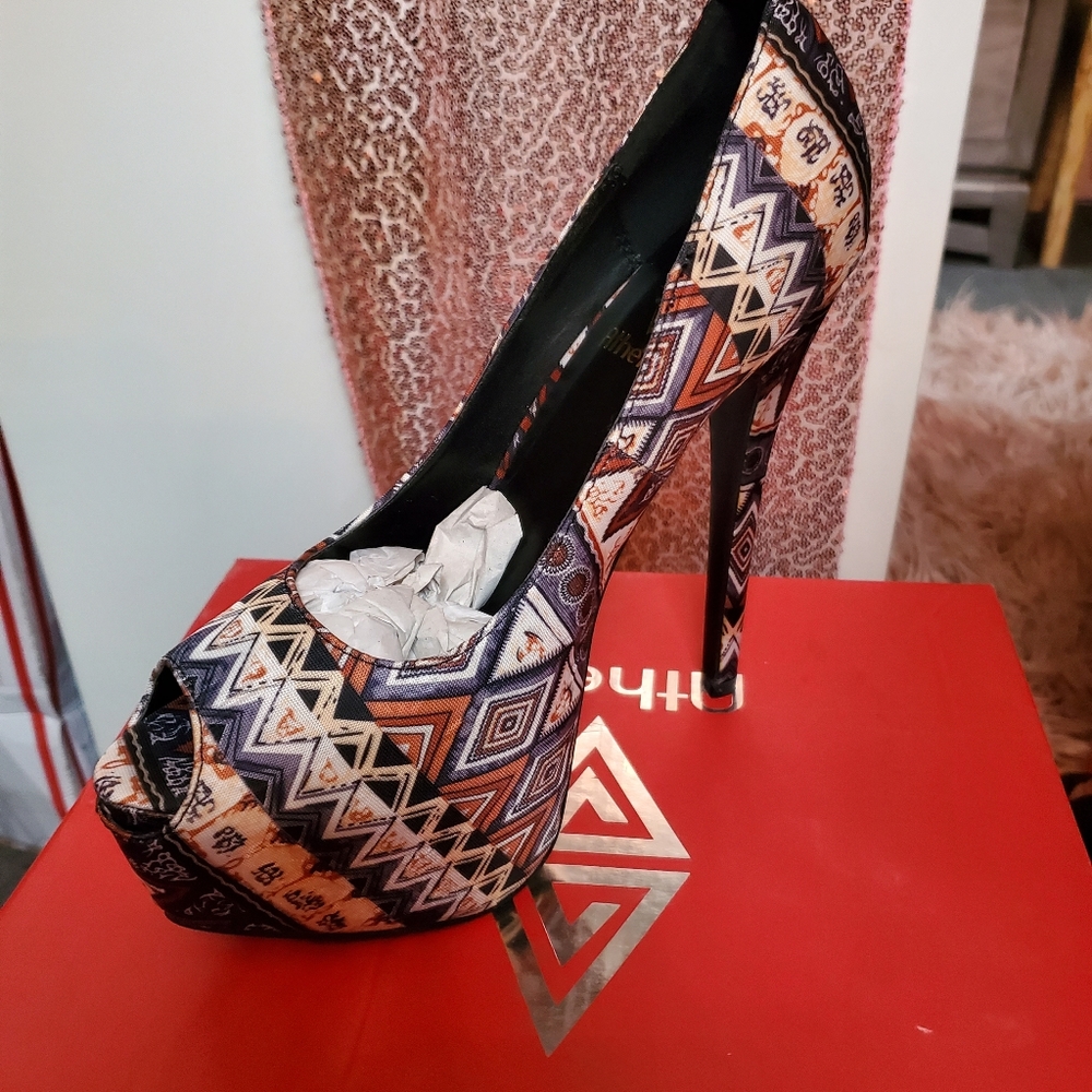 Brand new stelledo heels, multi color pattern, 6.5" heel, size 9